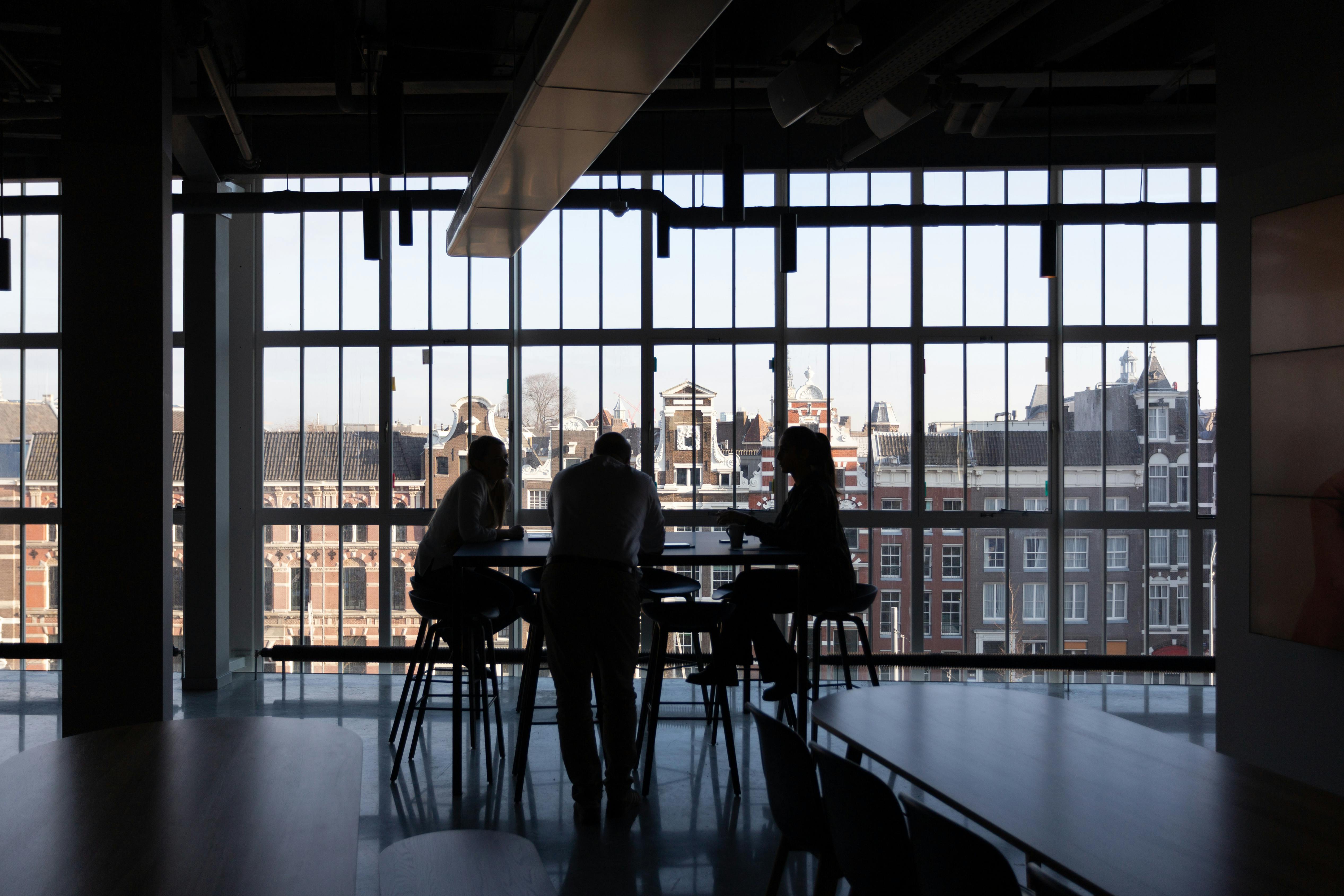 Oxon Capital team in conversation at the office